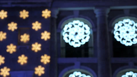 Defocus evening architectural building decorated with festive Christmas garland Stock Footage 140781968