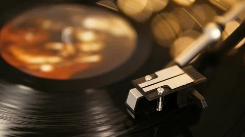 Defocus in focus on the stylus with a needle turntable vinyl record. Rotate Stock Footage 91645223
