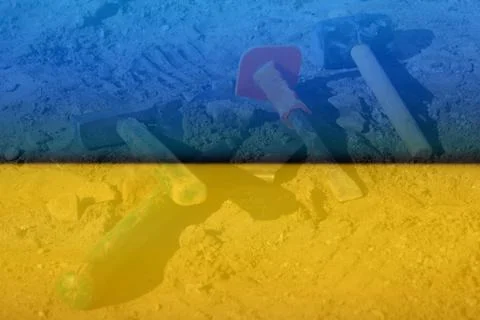Defocus hammer, mallet, chisel and bayonet of the shovel lie on the ground. Set Stock Photos