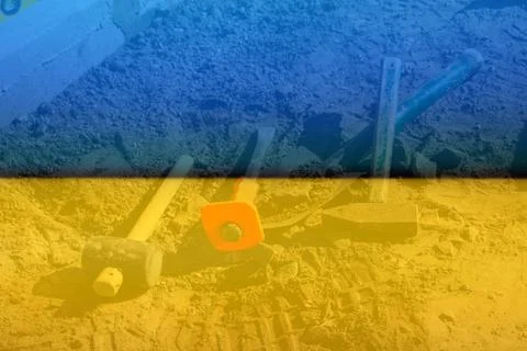 Defocus hammer, mallet, chisel and bayonet of the shovel lie on the ground. S Stock Photos