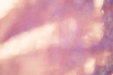 Defocus light background pink with yellow. Blurred sparkles. Defocus lights.. Stock Illustration