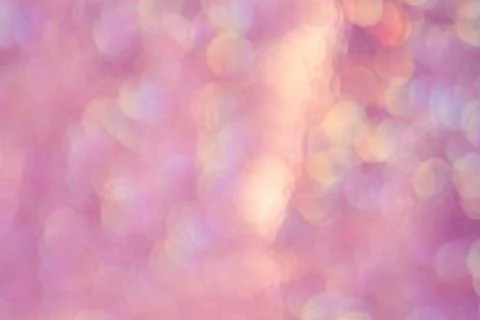 Defocus light background pink with yellow. Blurred sparkles Stock Illustration