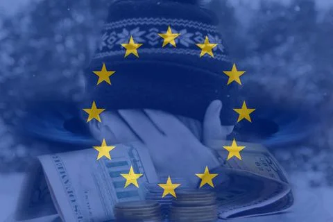 Defocus man hiding face. Increase in the cost of gas bill. European Union fla Фото