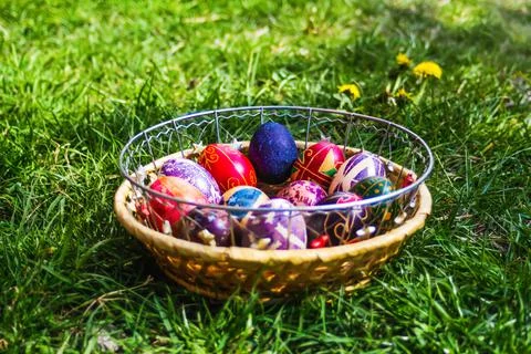 Defocus multicolored easter eggs. Decorated pysanka and krashanka. Wooden Bas Stock Photos