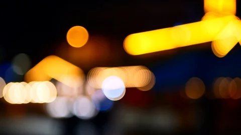 Defocus night view of holiday lights and city traffic on the streets 4K Stock-Footage 116136357