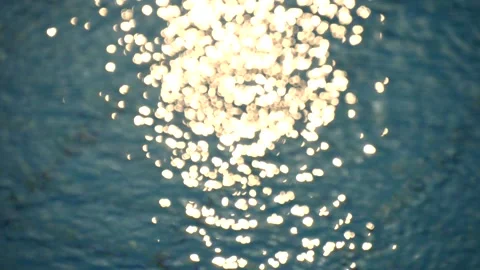 Defocus Ripples, sun glare, circles on waves water. Sea ripples. Sun glare Stock Footage 134627959