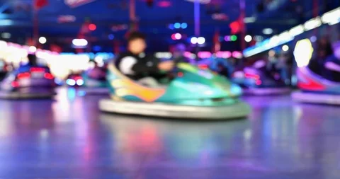 Defocus view of Illumination and motion of bumper cars. Stock Footage 113703473