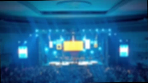 Defocused Abstract Background of Cheering concert crowd with colorful show light Stock Footage 294274565