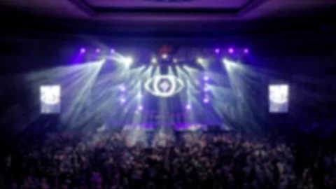 Defocused Abstract Background of Cheering concert crowd with colorful show light Video stock 294274637