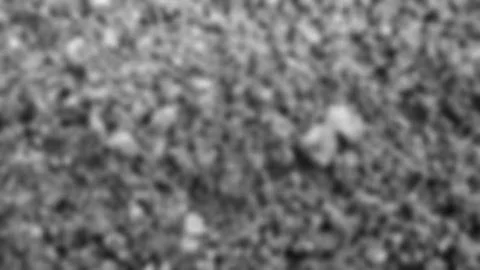 Defocused abstract background of gray sand Stock Photos