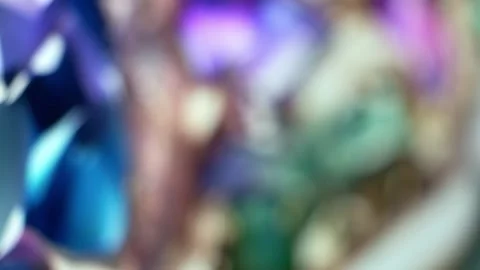 Defocused abstract background. A kaleidoscope of translucent sparkles, as if Stock Footage 249929360