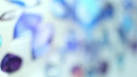 Defocused abstract background. A kaleidoscope of translucent gemstones, each as Stock Footage 249930130