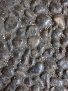 Defocused abstract background of we pebbles Stock Photos