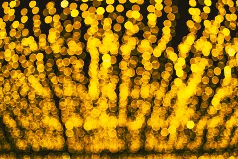 Defocused abstract bokeh pattern from lighting decor for background. Stock Photos