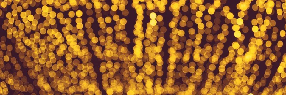 Defocused abstract bokeh pattern from lighting decor for background. Stock Photos