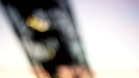 Defocused Abstract of Dark Metal Beam and Warm Bokeh, Bright Backdrop Stock Footage 341302066
