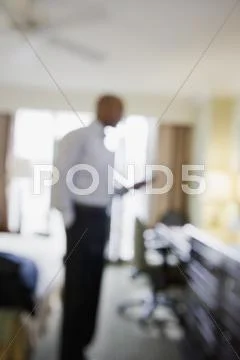 Defocused African Businessman In Hotel