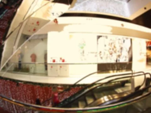 Defocused and blurred image of a large shopping mall Stock Photos