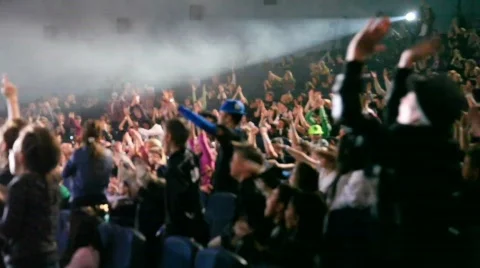 Defocused audience raising hands during hip-hop show Stock Footage 878090
