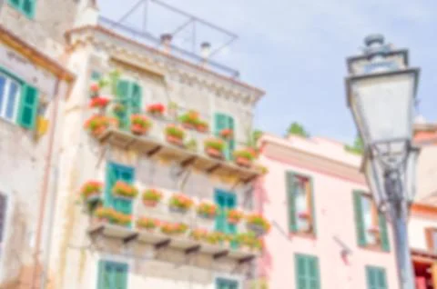Defocused background of an ancient building in a small italian old town Stock Photos