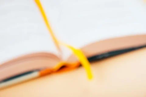 Defocused background with book Stock Photos