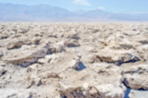 Defocused background of Devil's Golf Course in Death Valley, California Stock Photos