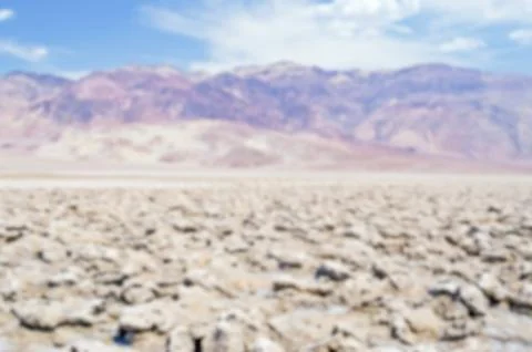 Defocused background of Devil's Golf Course in Death Valley, California Stock Photos