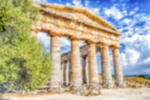 Defocused background with the greek temple of Segesta, Sicily, Italy Stock Photos