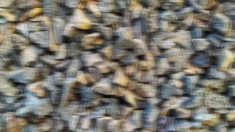 Defocused background of ground stone of many small stones. Stock Photos