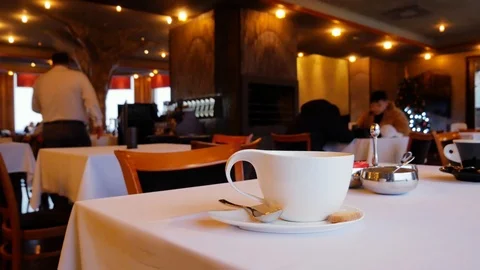 Defocused background - a group of people is sitting in arestaurant Stock Footage 99321939