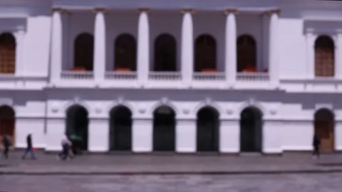 Defocused background of a large square in a city with blurred people Stock Footage 153721380