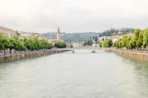 Defocused background with view over Adige River in Verona, Italy Foto stock