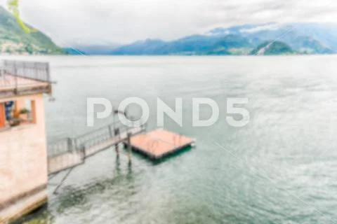 Defocused background with view over Lake Como from Varenna, Italy Stock Photos