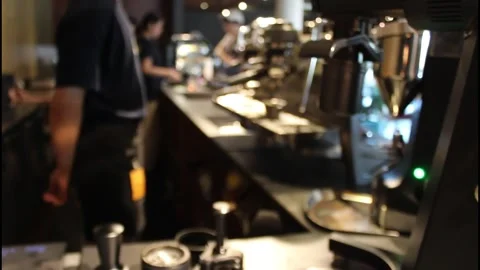 Defocused barista is standing in front of coffee machine Stock Footage 342620488