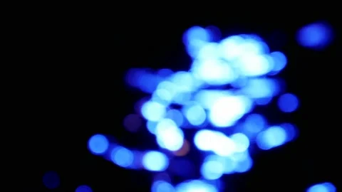 Defocused blinking blue lights reflection of police ship on the river Video stock 136240525