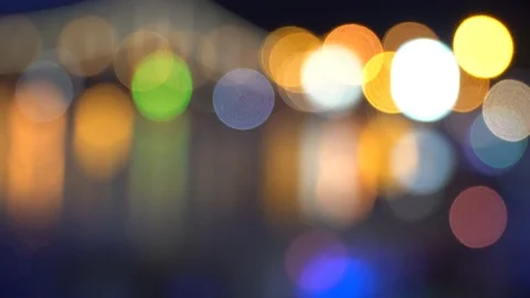 Defocused Blinking lights on night bridge, sparkle in water reflection Stock Footage 93699339