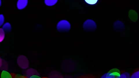 Defocused blue bokeh on a dark background Video stock 226096968