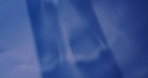 Defocused blue light lens flare radiant optical Stock Footage 339778088