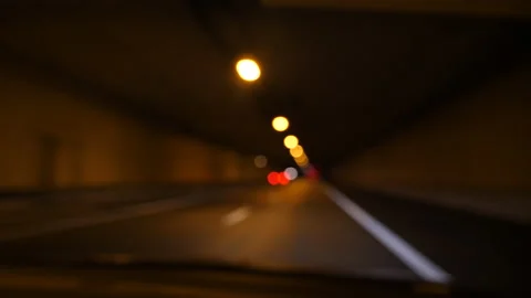 Defocused blur view of car driving on night highway Stock Footage 169193662