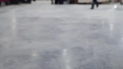 Defocused, blurred image of the legs of walking people. Stock Footage 134254230