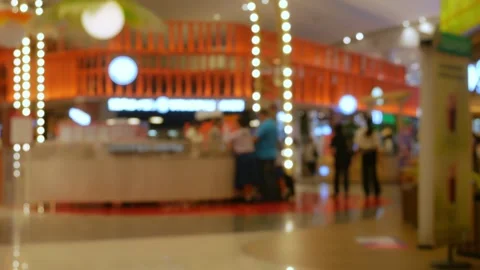 Defocused blurred interior of a modern shopping mall Stock Footage 333292085