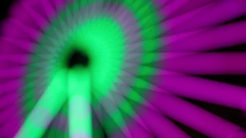 Defocused blurred light show on ferris wheel at night Stock Footage 154649165