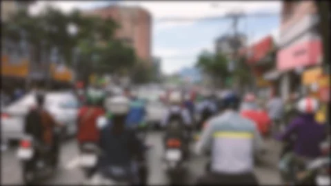 Defocused, blurred of slow moving traffic with lots of motorcycles, motorbike Stock Footage 111138479