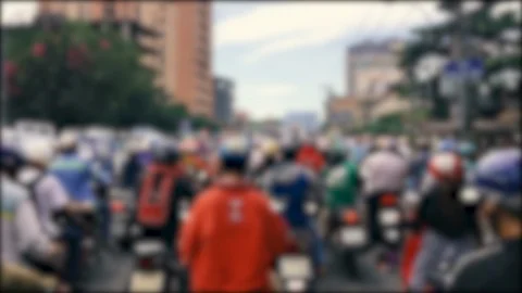 Defocused, blurred of slow moving traffic with lots of motorcycles, motorbike Stock Footage 111139368