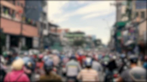 Defocused, blurred of slow moving traffic with lots of motorcycles, motorbike Stock Footage 111139515