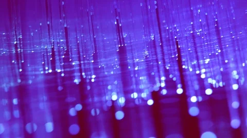 Defocused blurred view of large fiber optics light with red background Stock Footage 125163503