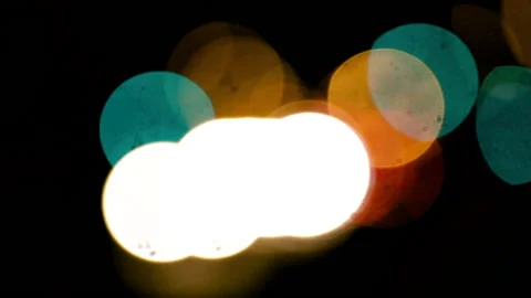 Defocused bokeh blinking lights background Stock Footage 169568431