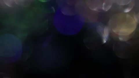 Defocused bokeh light background video with cool colors Stockbeeldmateriaal 317461651