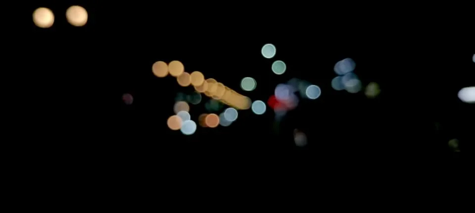 Defocused Bokeh Lights Abstract texture. Night Bokeh Light In Big City Stock Photos