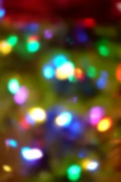 Defocused christmas lights background Stock Photos